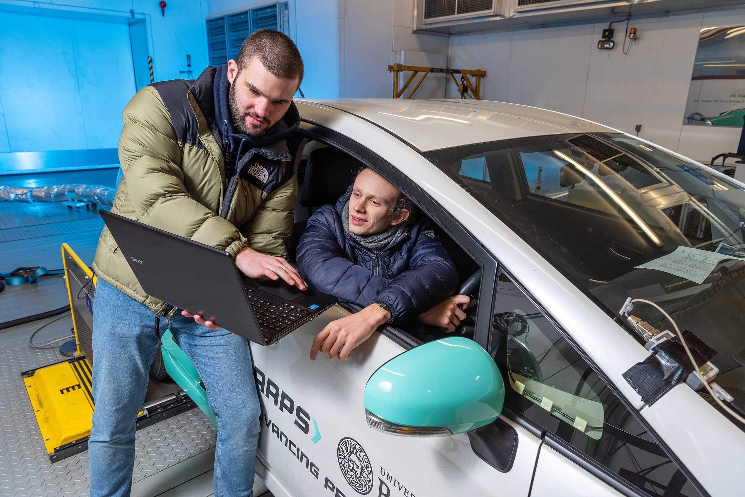 Rob Gray and Thomas Barthelay working with the IAAPS test car